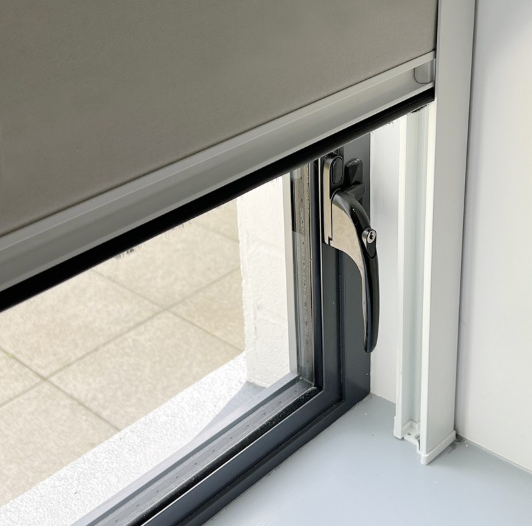 Dual roller window shades with Side Channels